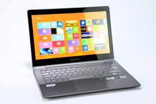 Samsung Series 7 Ultra NP740U3E laptop with Windows screen displayed.
