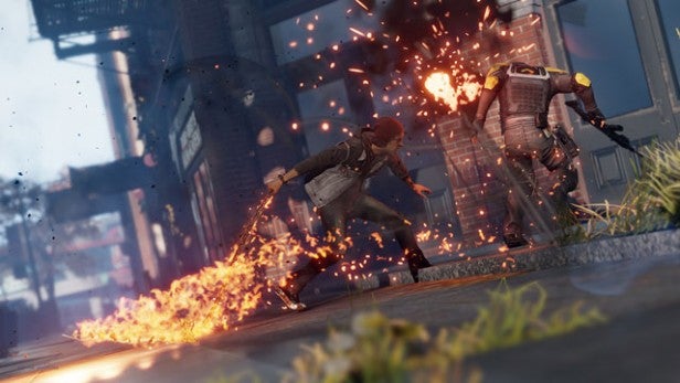 InFamous: Second Son gameplay showing character using fire powers.InFamous: Second Son gameplay scene with neon power display.
