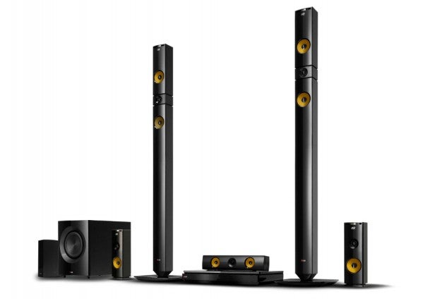 Black and gold home theater speaker system.