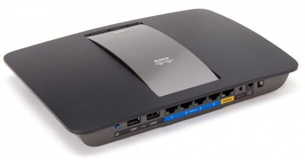 Linksys EA6700 router with rear ports visible.