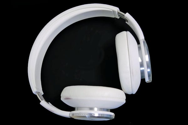 White WeSC Chambers by RZA headphones against a black background.