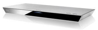 Panasonic DMP-BDT330 Blu-ray player on white surface.