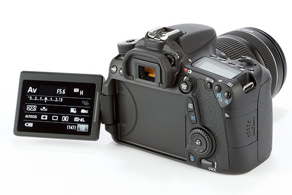 Canon EOS 70D DSLR camera with articulated LCD screen.