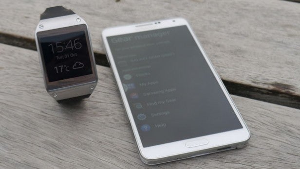 Smartwatch and smartphone displaying features on screen.