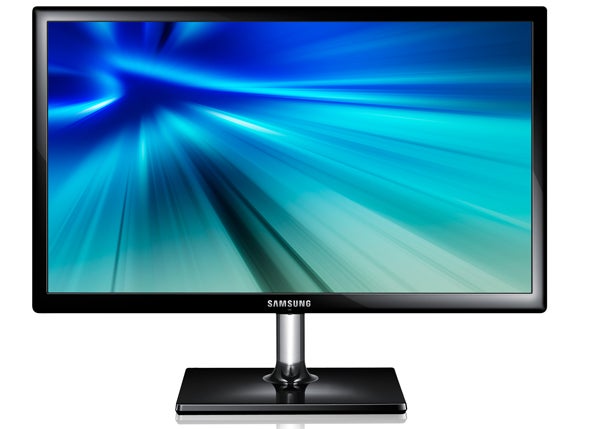 Samsung S27C570HS monitor displaying vibrant blue abstract wallpaper.