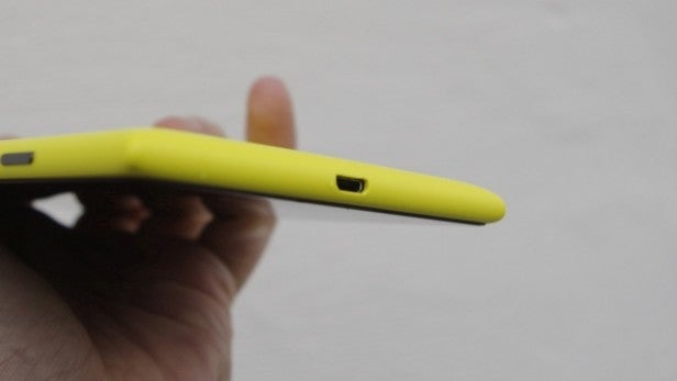 Side profile of a yellow Nokia Lumia 1520 smartphone