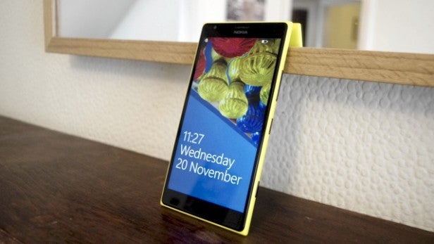 Nokia smartphone displaying time and date on home screen.