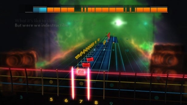 Screenshot of Rocksmith 2014 gameplay showing note highway and lyrics.