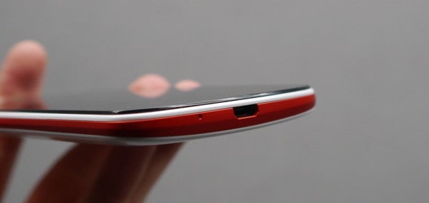 Close-up of smartphone highlighting battery charging port.