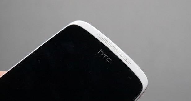 Close-up of HTC smartphone highlighting the earpiece and screen.