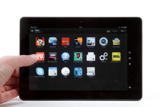 Kindle Fire HDX 8.9 tablet displaying colorful app icons.