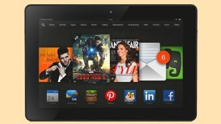 Kindle Fire HDX 8.9 tablet displaying colorful apps on screen