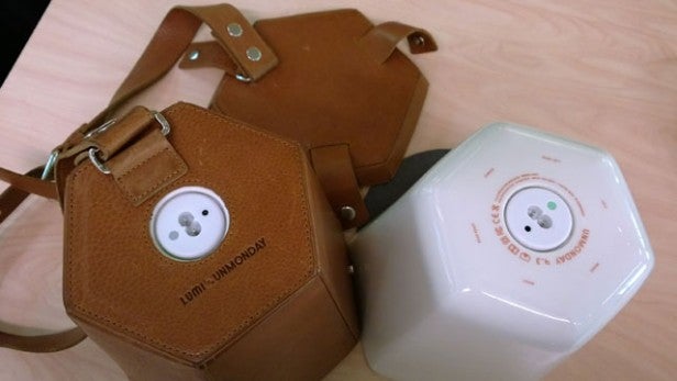 Unmonday 4.3L speaker with brown leather case.Unmonday 4.3L speaker with brown leather carrying case.