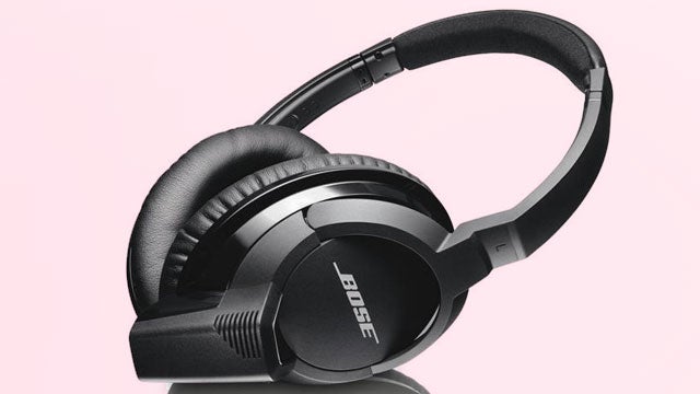 Bose AE2W Bluetooth Headphones on pink background.