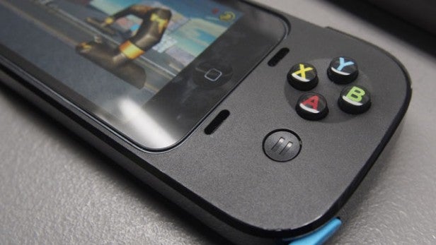 Logitech Powershell controller with iPhone displaying game.