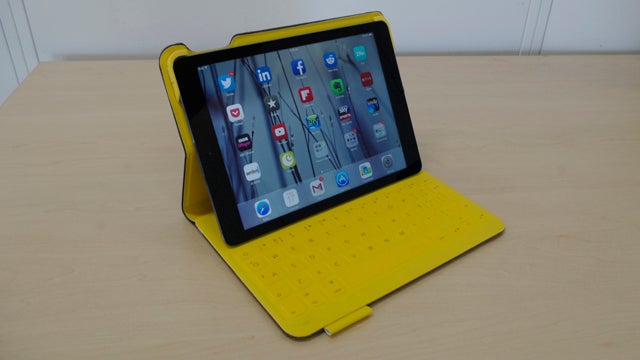 Logitech FabricSkin Keyboard Folio with iPad Air on desk.