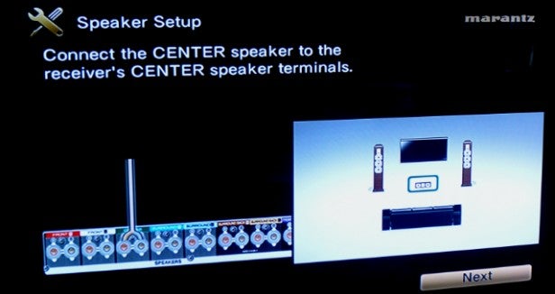 Marantz SR6008Speaker setup guide showing center speaker connection instructions.