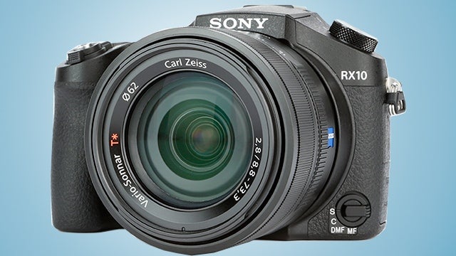 Sony RX10 camera with Carl Zeiss lens against blue background.