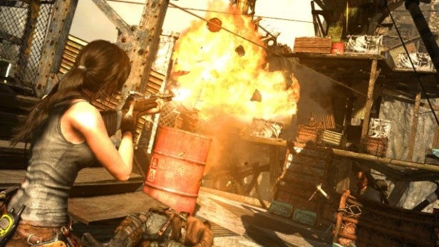 Lara Croft shooting a flaming arrow in Tomb Raider game.
