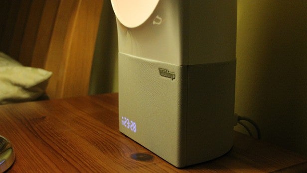 Withings Aura sleep aid device on bedside table.