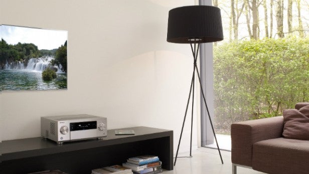 Pioneer SC-LX87Audio receiver on living room cabinet with modern decor.