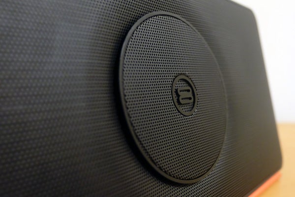 Soundbook X3 1Close-up of Bayan Audio Soundbook X3 speaker grille and logo.