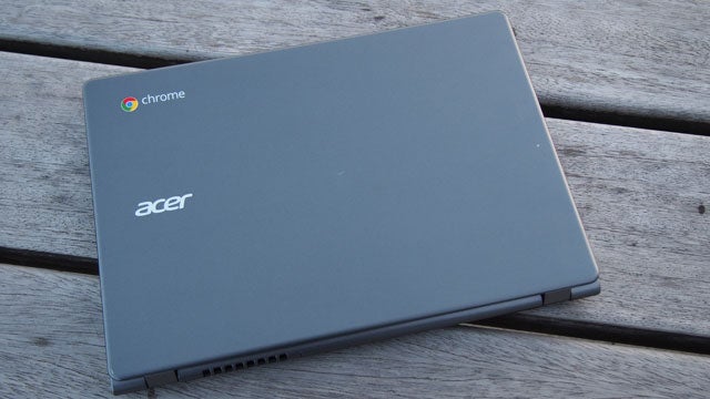Acer C720 Chromebook closed on wooden surface.