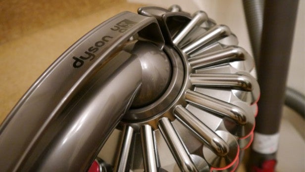 Close-up of Dyson vacuum cleaner head focusing on design details.