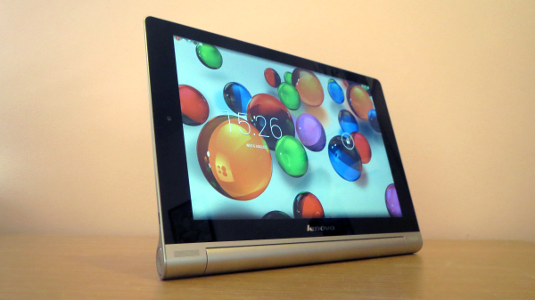 Lenovo Yoga Tablet 10 HD+ on table with colorful screen display.