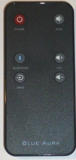 Remote control with power, mute, Bluetooth, and volume buttons.