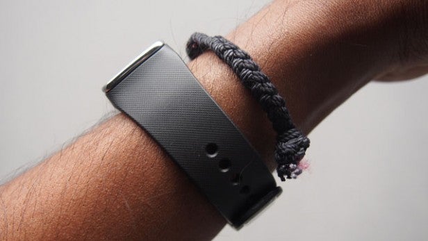 Samsung Gear Fit fitness tracker worn on a wrist.