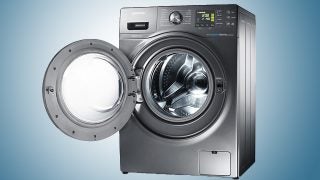 Samsung WD906U4SAGD washer dryer with open door.