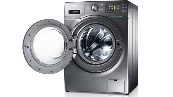 Samsung WD906U4SAGD washer dryer with open door.