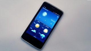 Acer Liquid Z4 smartphone displaying weather forecast on screen.