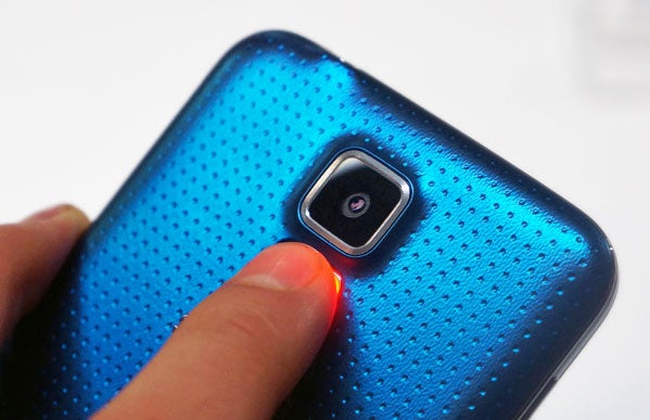 Close-up of Samsung Galaxy S5 camera and fingerprint sensor.