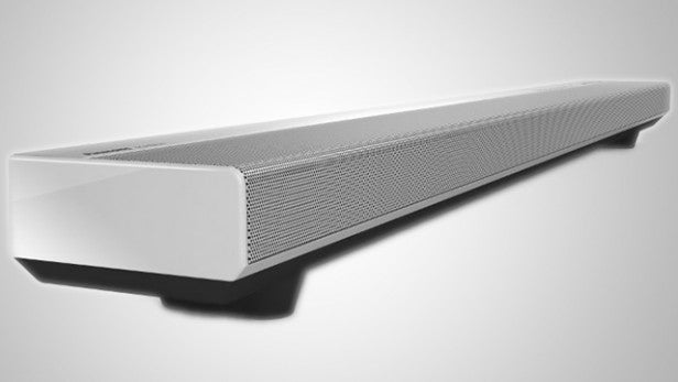 White modern soundbar on a gray background.