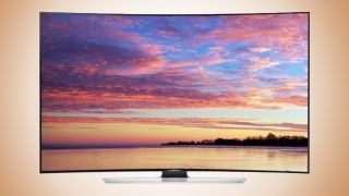 Samsung UE65HU8500 curved TV displaying sunset scenery.