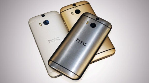 Three HTC One M8 smartphones in silver and gold