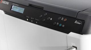 Close-up of Kyocera ECOSYS P6021cdn printer control panel.
