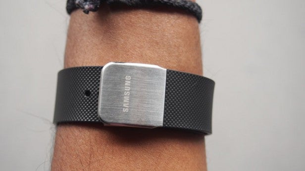 Samsung Gear 2 Neo smartwatch on a person's wrist.
