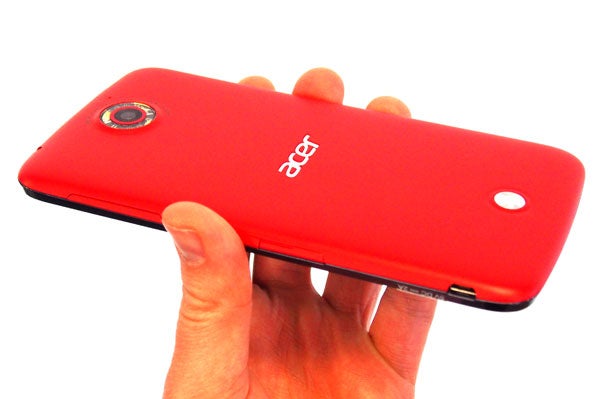 Hand holding a red Acer Liquid S2 smartphone