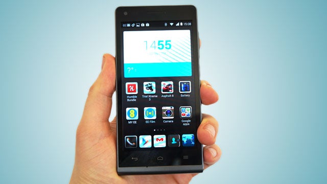 EE Kestrel smartphone held in hand displaying apps on screen.