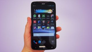 Hand holding an Acer Liquid S2 smartphone.