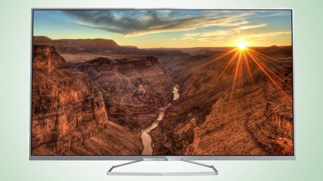 Philips 55PFS6609 television displaying a sunset canyon image.