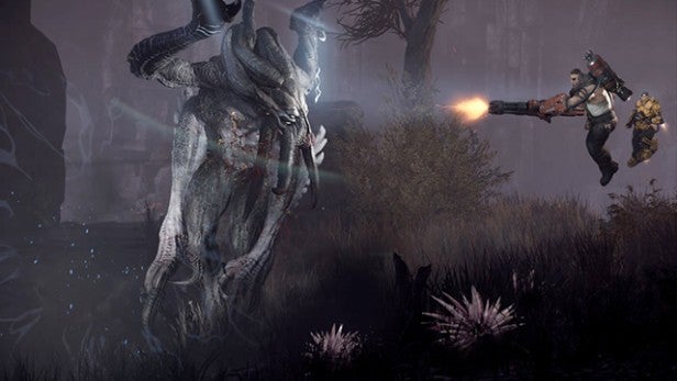 Screenshot from Evolve game showing hunter firing at monster.