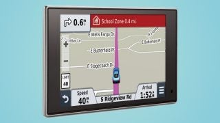 Garmin nuvi 3597LMT GPS displaying map and driving data.