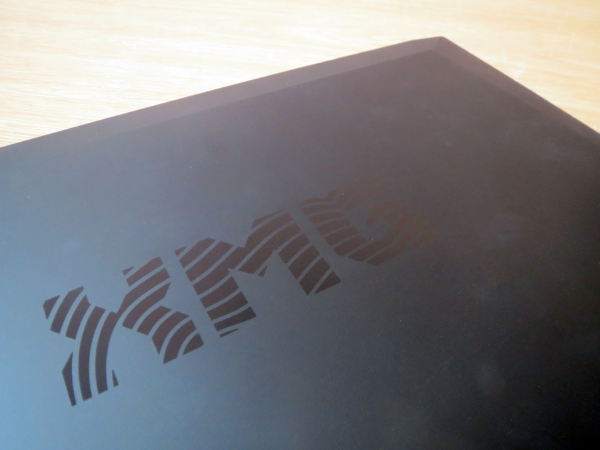 Schenker XMG P304 laptop lid with logo