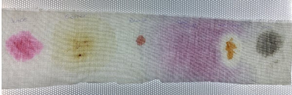Stain removal test strip with various untreated stains.Stain removal test strip with one untreated stain.