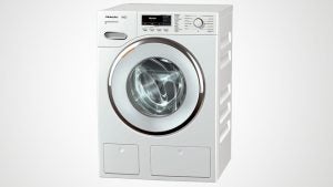 Miele WMR 560 WPS washing machine on white background.