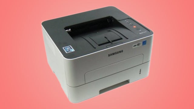 Samsung Xpress M2835DW printer on a pink background.